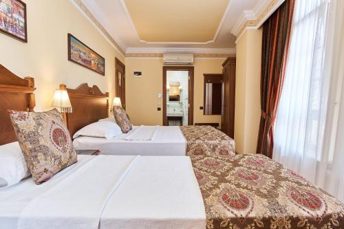 Habitación Triple del hotel Best Western Empire Palace and Spa - Special Class. Foto 14