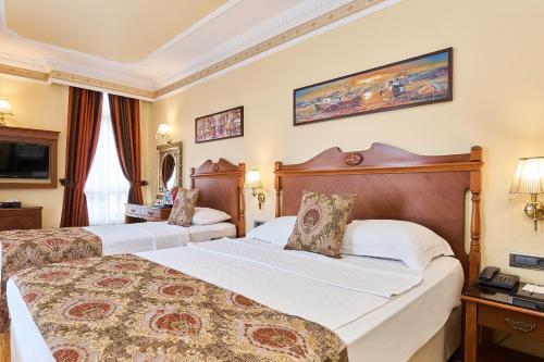 Habitación Triple del hotel Best Western Empire Palace and Spa - Special Class. Foto 16