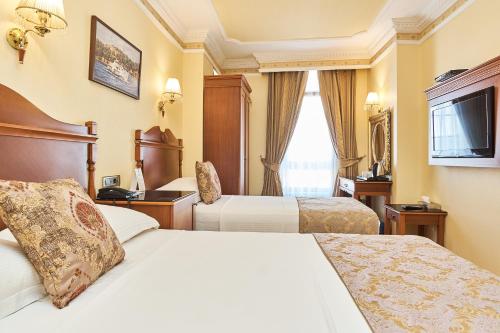 Habitación Triple del hotel Best Western Empire Palace and Spa - Special Class. Foto 19