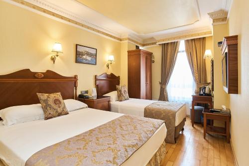 Habitación Triple del hotel Best Western Empire Palace and Spa - Special Class. Foto 20