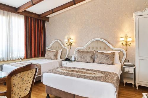 Habitación Familiar del hotel Best Western Empire Palace and Spa - Special Class. Foto 10