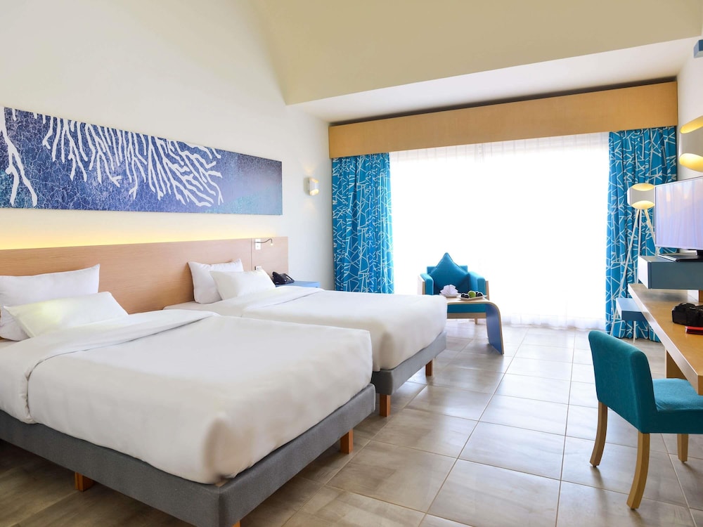 Habitación Superior 2 Camas Individuales - Lado de la Piscina del hotel Novotel Marsa Alam Beach Resort. Foto 4