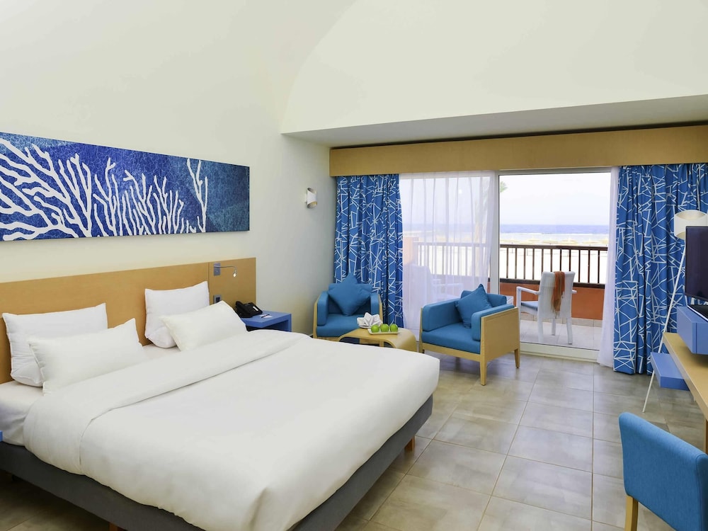 Habitación Deluxe, 02 camas individuales, Frente al Mar del hotel Novotel Marsa Alam Beach Resort. Foto 4