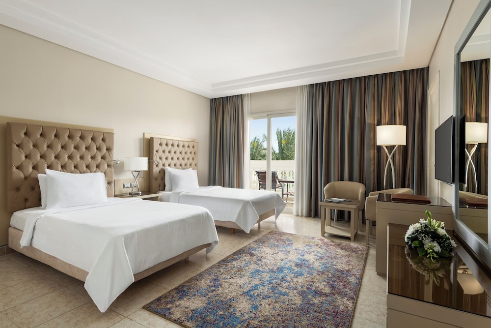 Habitación Deluxe Aqua Cama Twin del hotel Rixos Premium Seagate. Foto 1