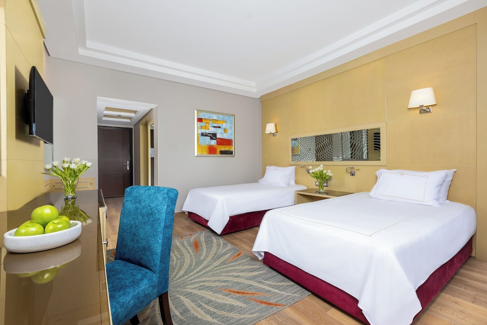 Habitación Deluxe Cama Twin del hotel Rixos Premium Seagate. Foto 1