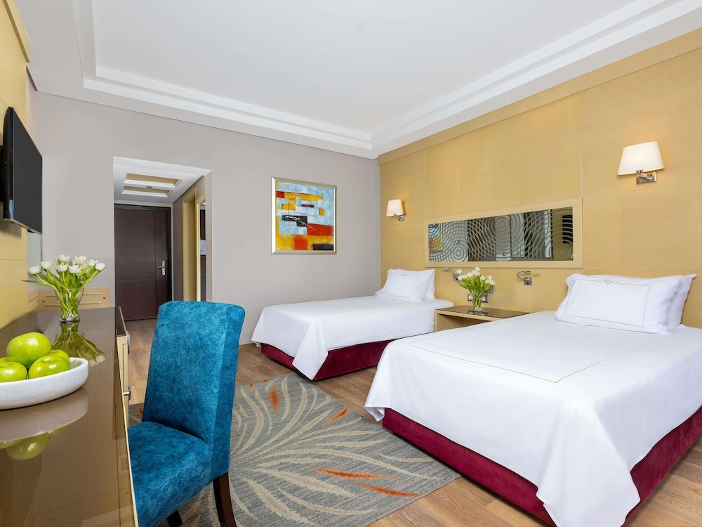 Habitación Deluxe Cama Twin del hotel Rixos Premium Seagate. Foto 2