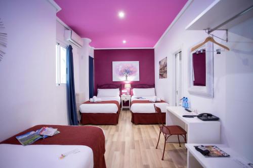 Habitación Triple del hotel Casual Valencia Vintage. Foto 9