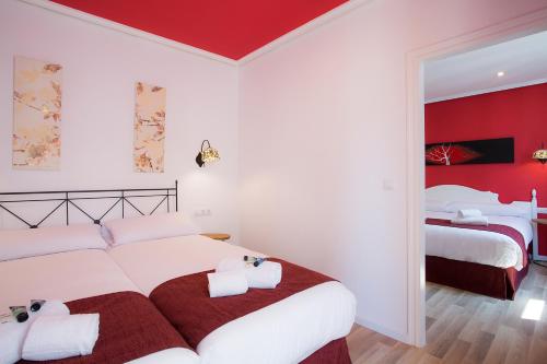 Habitación Cuádruple del hotel Casual Valencia Vintage. Foto 14