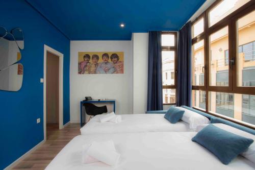 Habitación Cuádruple del hotel Casual Valencia Vintage. Foto 15