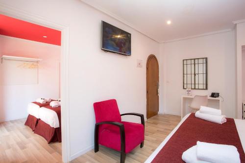 Habitación Cuádruple del hotel Casual Valencia Vintage. Foto 16
