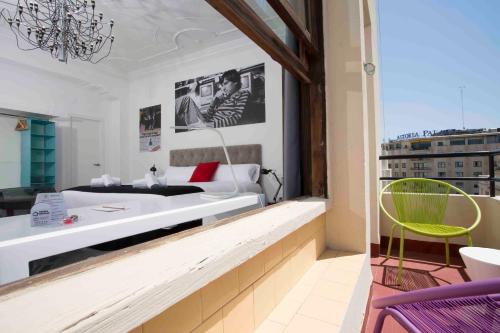 Habitación Doble con Terraza del hotel Casual Valencia Vintage. Foto 15