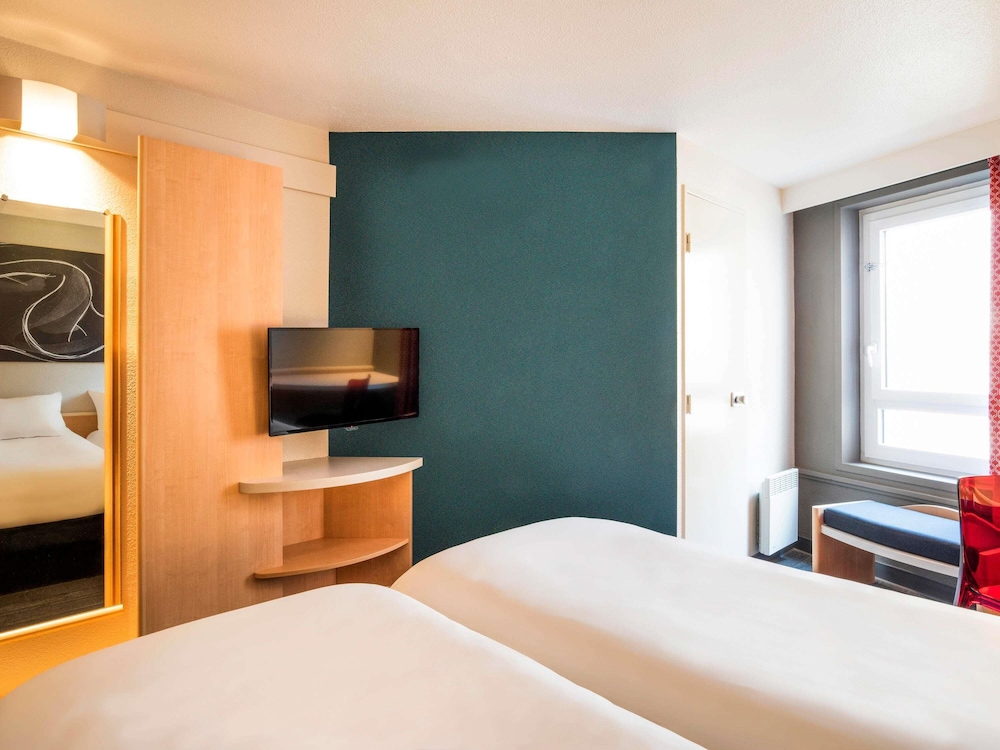 Estándar con 2 camas individuales del hotel Ibis Tours Centre Gare. Foto 3