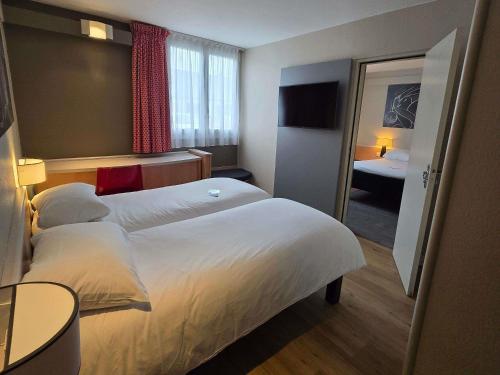 Habitaciones Comunicadas del hotel Ibis Tours Nord. Foto 3
