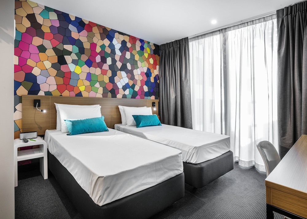 Habitación Estándar 2 Camas Individuales del hotel Ibis Styles Brisbane Elizabeth Street. Foto 1