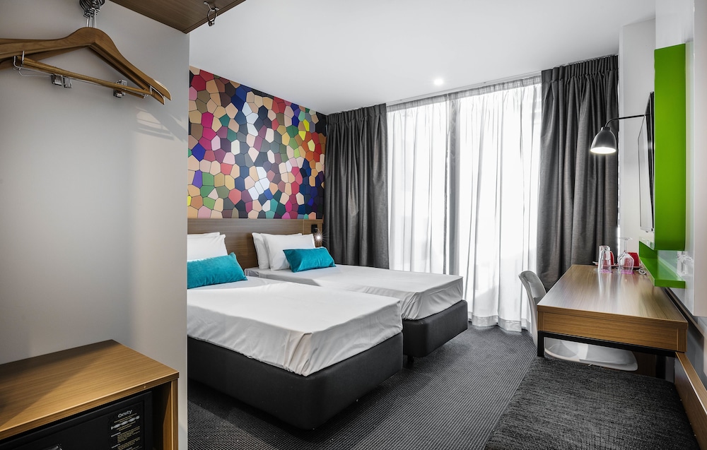 Habitación Estándar 2 Camas Individuales del hotel Ibis Styles Brisbane Elizabeth Street. Foto 3