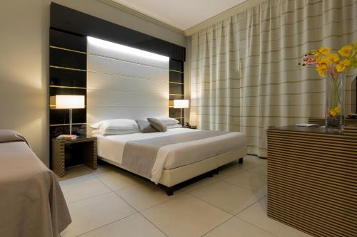 Habitación Triple del hotel Palazzo Salgar. Foto 3