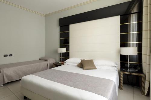 Habitación Triple del hotel Palazzo Salgar. Foto 4