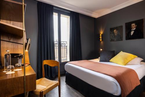 2 Habitaciones Dobles comunicadas del hotel Coq Paris. Foto 1