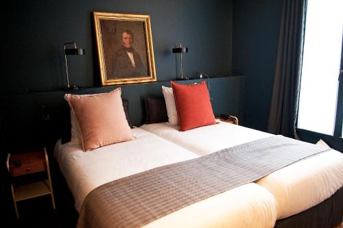 Habitación Doble Deluxe del hotel Coq Paris. Foto 1