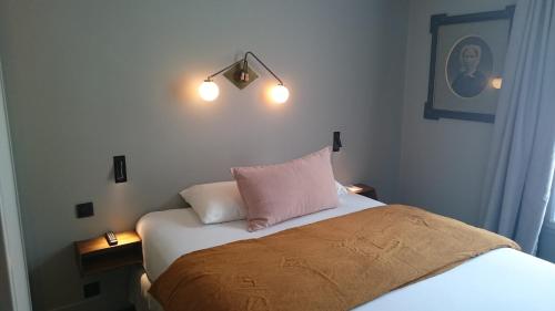 Habitación Clásica del hotel Coq Paris. Foto 1