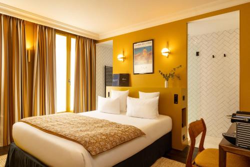 Habitación Doble Deluxe del hotel Coq Paris. Foto 7