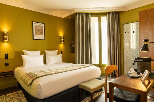 Habitación Doble Deluxe del hotel Coq Paris. Foto 9