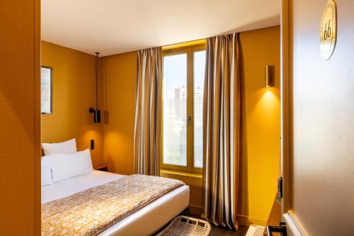 2 Habitaciones Dobles comunicadas del hotel Coq Paris. Foto 1