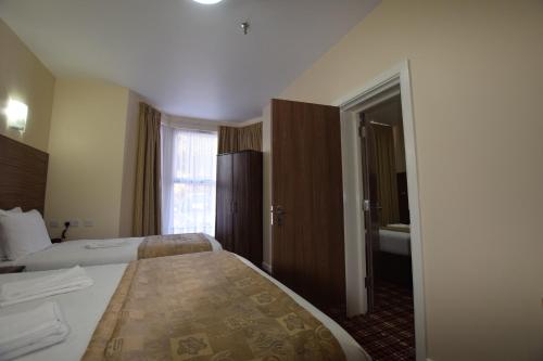 Habitación Doble - 2 camas del hotel Lucky 8. Foto 6