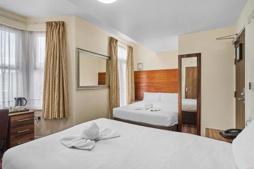 Habitación cuádruple del hotel Lucky 8. Foto 4