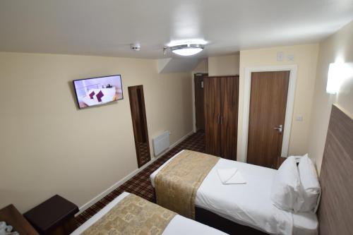 Habitación cuádruple del hotel Lucky 8. Foto 5