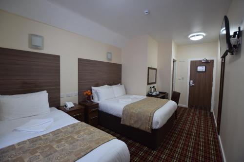 Habitación cuádruple del hotel Lucky 8. Foto 6