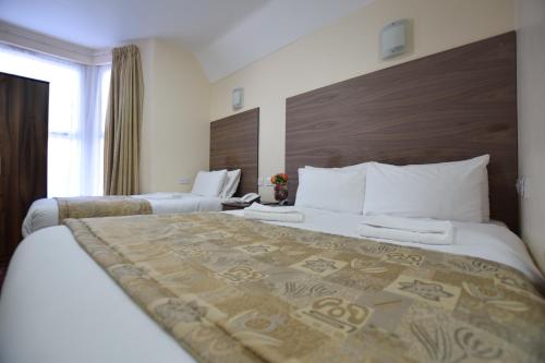 Habitación cuádruple del hotel Lucky 8. Foto 7