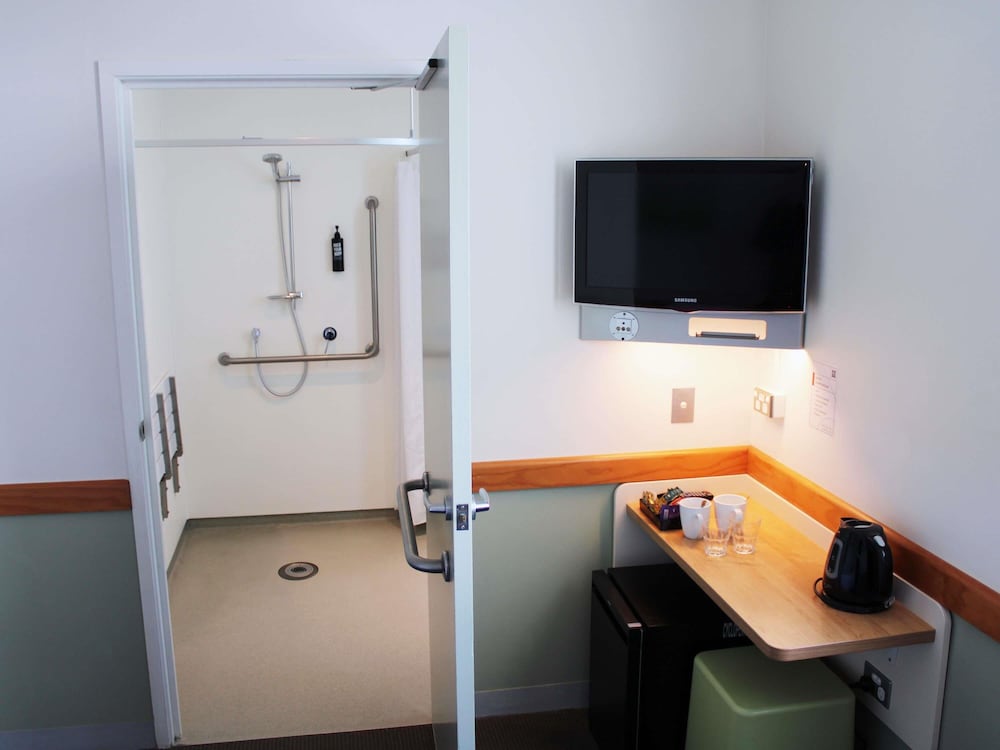 Habitación estándar con 2 camas individuales - Accesible del hotel Ibis Budget Auckland Airport. Foto 5