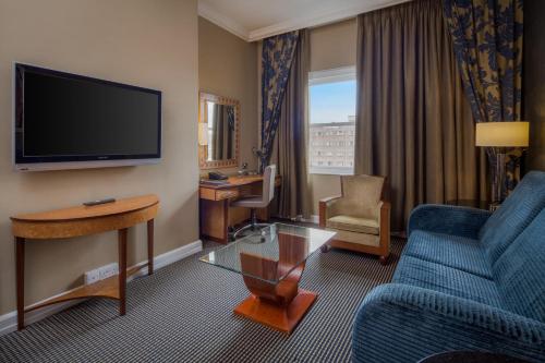 Suite Queen con acceso al salón del hotel Hilton London Paddington