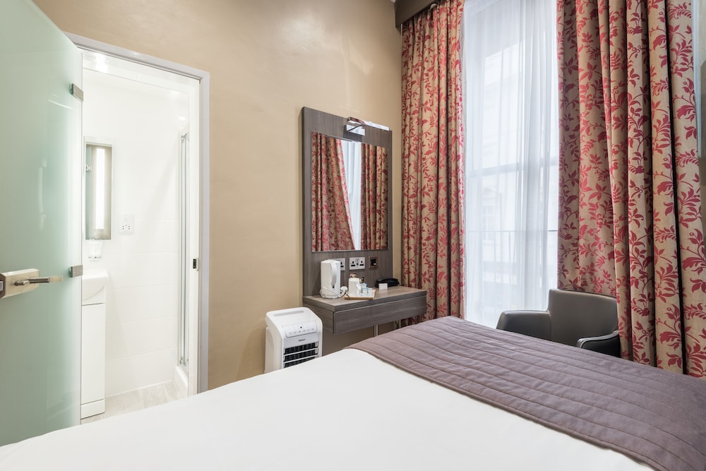 Habitación con 2 camas individuales del hotel Brunel. Foto 7