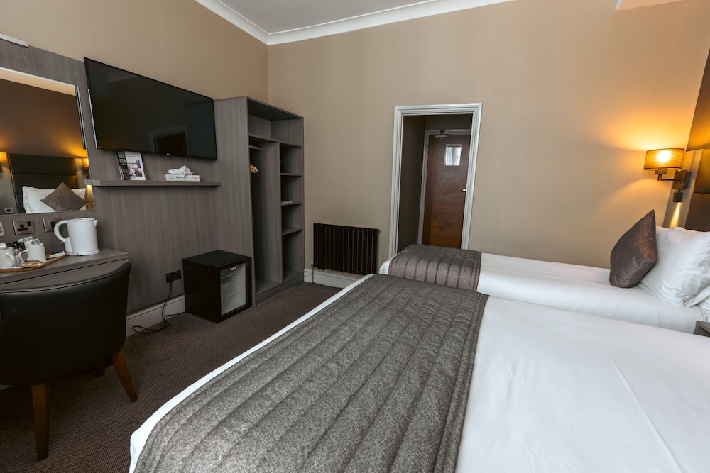 Habitación triple del hotel Brunel. Foto 8