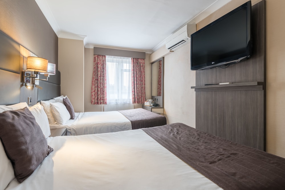 Habitación cuádruple del hotel Brunel. Foto 8