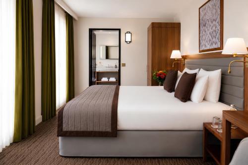 Superior King Room with King Bed del hotel Mayflower Opéra. Foto 1