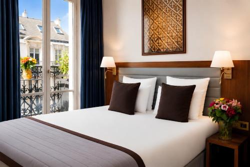 Habitación Clásica con cama grande del hotel Mayflower Opéra