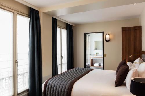 Superior King Room with King Bed del hotel Mayflower Opéra. Foto 2