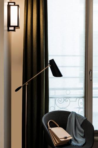 Habitación Deluxe con cama extragrande del hotel Mayflower Opéra