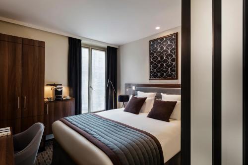 Habitación Clásica con cama grande del hotel Mayflower Opéra