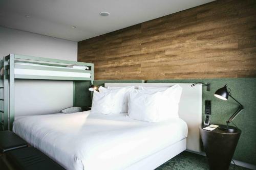 Habitación Familiar Deluxe con vistas al mar del hotel Octant Ponta Delgada. Foto 1