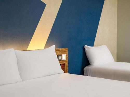 Habitación Estándar con 3 camas individuales del hotel ibis budget London Heathrow Central