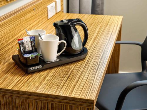 Habitación adaptada para personas con discapacidad - 2 camas individuales del hotel ibis budget London Heathrow Central. Foto 3