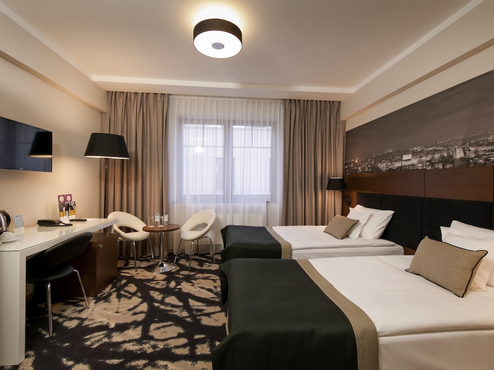Habitación Privilege con dos camas individuales del hotel Mercure Bydgoszcz Sepia. Foto 2