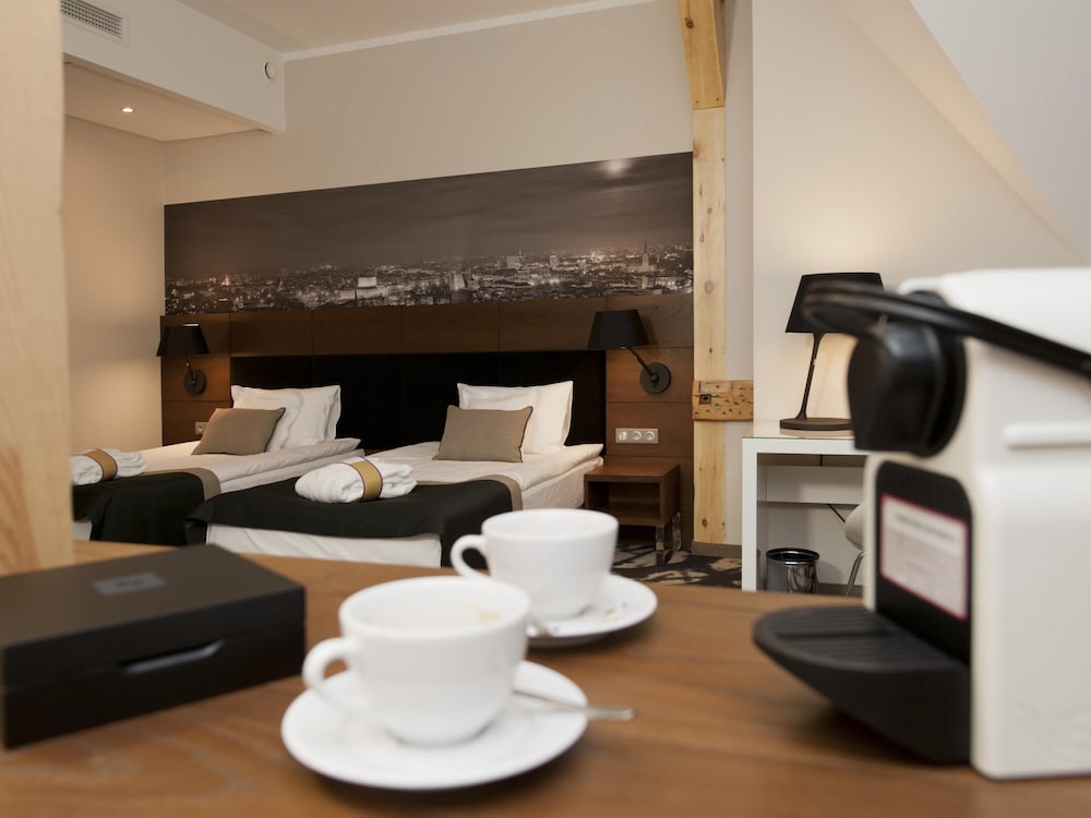 Habitación Privilege con dos camas individuales del hotel Mercure Bydgoszcz Sepia. Foto 3