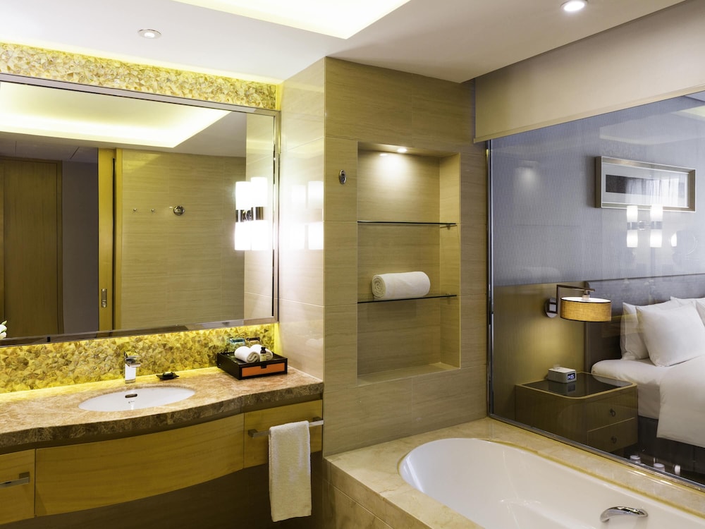 Deluxe con 1 cama King del hotel Pullman Changshu Leeman. Foto 2