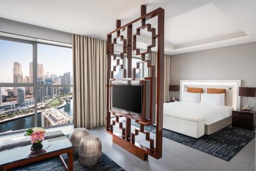 Suite Grand tipo estudio con acceso a la Soluna del hotel The First Collection Marina. Foto 1