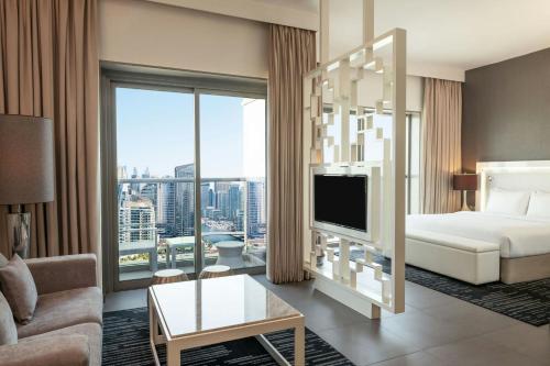 Suite Grand tipo estudio con acceso a la Soluna del hotel The First Collection Marina. Foto 11